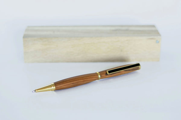 Hand turned pen of dark native irish wood with wooden pen box. 